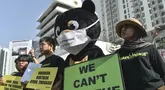Greenpeace Malaysia dan Himpunan Advocacy Rakyat Malaysia (HARAM) menggelar aksi damai di depan Kedutaan Besar Indonesia di Kuala Lumpur, Jumat, 4 September 2026. (AFP/ Arif Kartono)