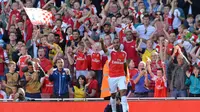 Theo Walcott celebrates after scoring the first goal for Arsenal Action Images via Reuters / Alan Walter