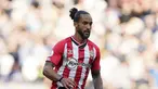 Gelandang Southampton, Theo Walcott beraksi selama pertandingan melawan Leeds United pada pertandingan Liga Inggris di St. Mary's Stadium di Southampton, Inggris, pada 16 Oktober 2021. (AP Photo/Steve Luciano)