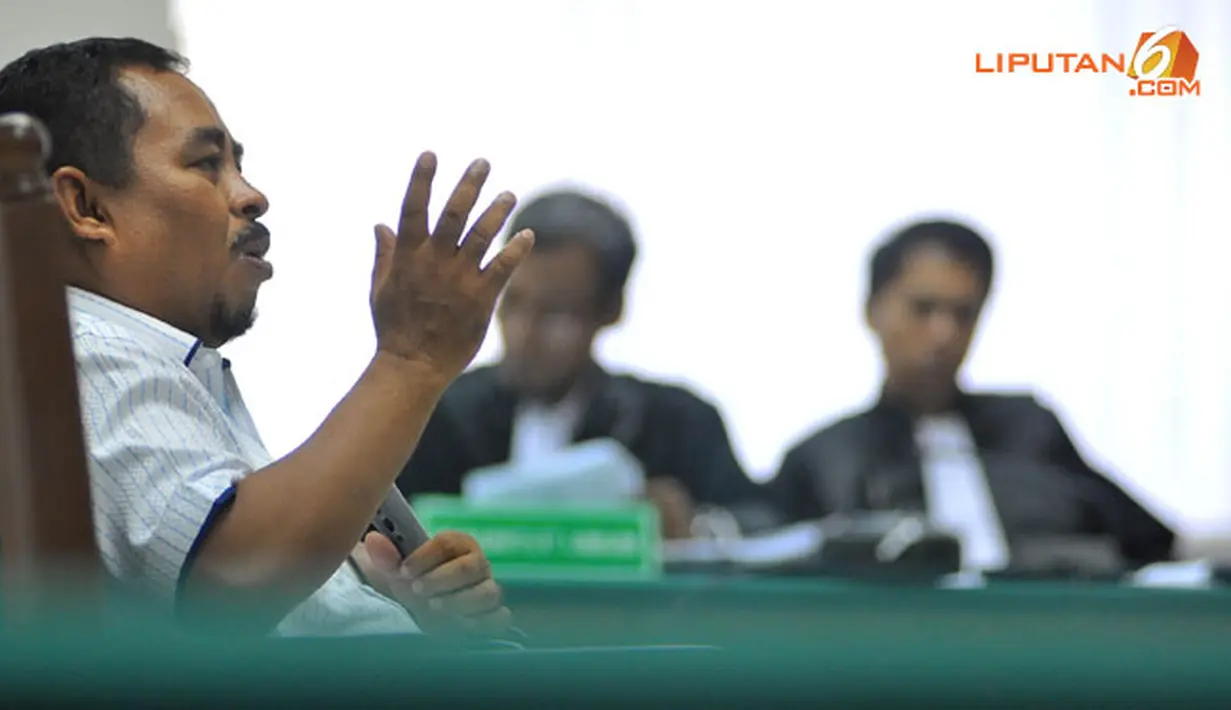 Saat di persidangan, Luthfi mengaku pernah membahas fee pengadaan kuota impor daging sapi dengan Ahmad Fathanah (Liputan6.com/ Abdul Aziz Prastowo).