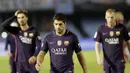Penyerang Barcelona, Luis Suarez, dan rekan-rekannya tampak kecewa usai takluk dari Celta Vigo pada laga La Liga di Stadion Balaidos, Vigo, Minggu (2/10/2016). Barcelona kalah 3-4 dari Celta Vigo. (EPA/Lavandeira Jr)