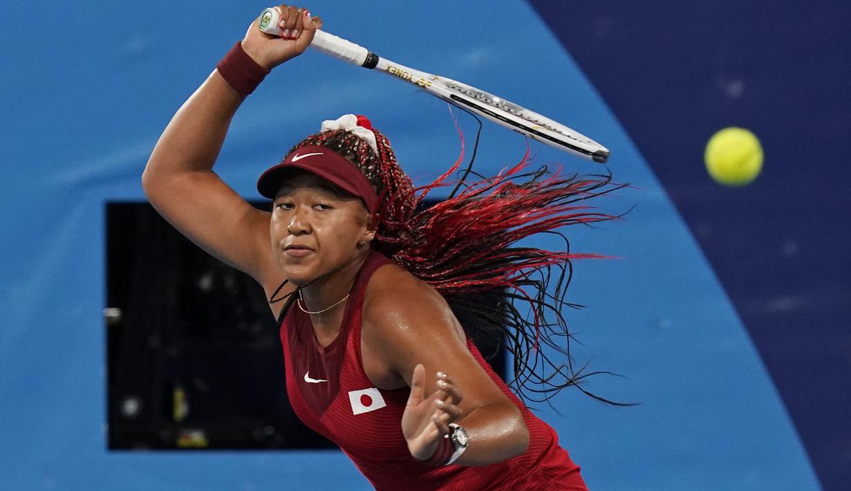 Olimpiade Tokyo 2020 merupakan debut Naomi Osaka di ajang olah raga paling bergengsi ini. Kekalahan dari Marketa, membuat dirinya harus terpaksa mengubur impiannya menyabet medali emas di tanah kelahirannya. (Foto: AP/Seth Wenig)