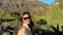 Selain New York, Devina Kirana juga menyempatkan berkunjung ke Los Angeles, Amerika Serikat. Ia berpose dengan latar taman yang luas. (Foto: Instagram/@kiranadevina)