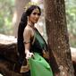 Tampilan Aulia Sarah saat berperan menjadi Badarawuhi dengan baju dan selendang warna hijau di film KKN di Desa Penari.(Foto: Instagram @owliasarah)