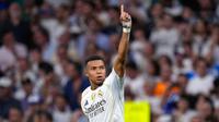 Pemain Real Madrid, Kylian Mbappe, melakukan selebrasi setelah mencetak gol ke gawang Marseille dalam laga matchday 1 League Phase Liga Champions 2025/2026 di Santiago Bernabeu, Rabu (17/9/2025) dini hari WIB. (AP Photo/Manu Fernandez)