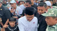 Calon Wakil Presiden (Cawapres) nomor urut 1, Muhaimin Iskandar alias Cak Imin menghadiri acara Istighosah dan Shalawat untuk Kemenangan AMIN di Lapangan Randuangung, Kabupaten Lumajang, Jawa Timur, Sabtu (3/2/2024).