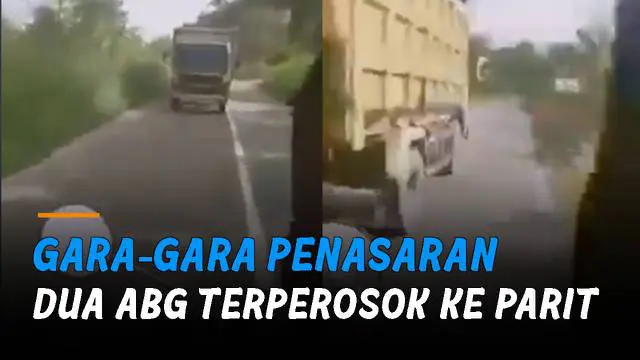 Keduanya mencoba mengikuti truk, ABG pengemudi tiba-tiba menepi hingga kemudian terpeleset dan jatuh.