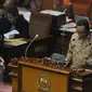 Ketua Panja UP2DP Totok Daryanto membacakan laporan saat Sidang Paripurna terkait peraturan UP2DP, Jakarta, Selasa (23/6/2015).  Dana Aspirasi akhirnya disahkan DPR. (Liputan6.com/Herman Zakharia)