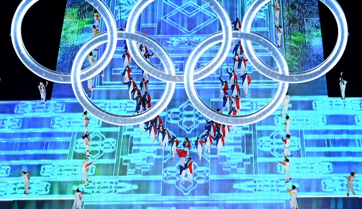Gambaran delegasi dari Prancis saat upacara pembukaan Olimpiade Musim Dingin Beijing 2022, di Stadion Nasional, yang dikenal sebagai Stadion Bird's Nest, di Beijing, pada 4 Februari 2022. (AFP/François-Xavier Marit)