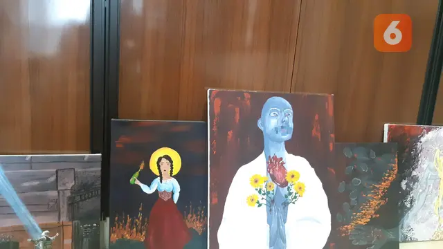 Lukisan terinspirasi invasi Rusia ke Ukraina karya putri Duta Besar Ukraina untuk Indonesia Vasyl Hamianin, Varvara Hamianin. (Liputan6.com/Tanti Yulianingsih)