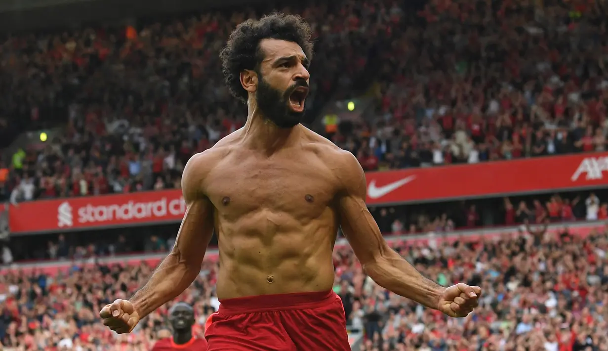 Tak ada seorangpun yang meragukan penampilan Mohamed Salah bersama Liverpool pada musim ini. Menjadi top skor sementara, Salah diprediksi akan menjadi mesin gol bagi negaranya, Mesir. Tak hanya itu, Salah berpeluang besar merengkuh gelar pemain terbaik di turnamen Piala Afrika 2021. (AFP/Paul Ellis)