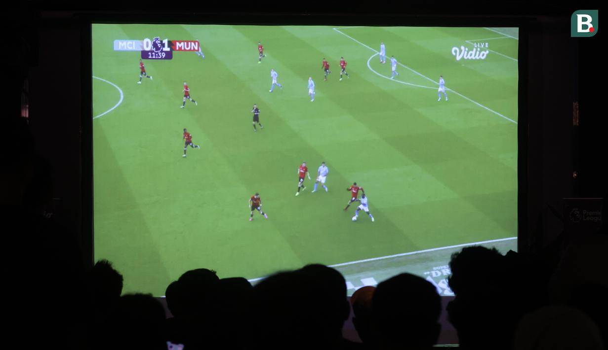 <p>Suasana Roaring Night Manchester City vs Manchester United di Babahramu Dine &amp; Bar, Episode Hotel, Gading Serpong, Tangerang, Minggu (3/3/2024). (Bola.com/M Iqbal Ichsan)</p>