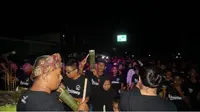 Kota Gorontalo kembali mengelar tradisi unik dalam membangunkan sahur yakni Koko'o. (Liputan6.com/Arfandi Ibrahim)
