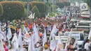 Mereka terus menyanyikan yel-yel dalam mendukung AMIN. (Liputan6.com/Angga Yuniar)