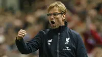 Jurgen Klopp senang dengan kemenangan perdana bersama Liverpool. (Reuters / Eddie Keogh)