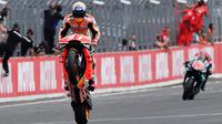 Pembalap Repsol Honda, Marc Marque, berhasil meraih podium juara MotoGP Jepang yang berlangsung di Sirkuit Twin Ring Motegi, Minggu (20/10/2019) siang WIB. (AFP/Toshifumi Kitamura)