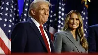 Donald Trump dan&nbsp;istrinya,&nbsp;Melania Trump, terlihat selama acara malam&nbsp;Pemilihan Presiden (Pilpres)&nbsp;di Palm Beach Convention Center, West Palm Beach, Florida, AS, 6 November 2024. (CHIP SOMODEVILLA/GETTY IMAGES NORTH AMERICA/Getty Images via AFP)