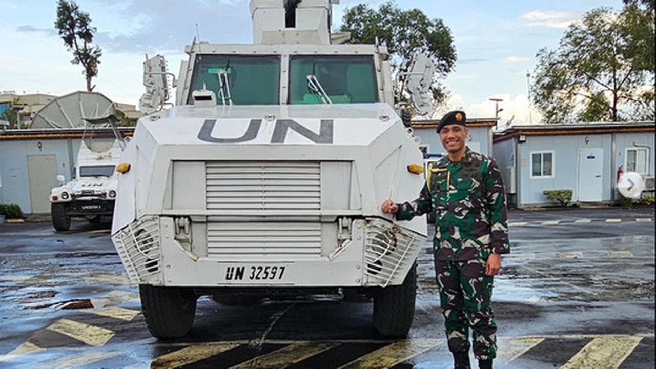 Potret Gagah Paulus Pandjaitan dengan Kendaraan Militer di Wilayah Konflik Mengenakan Seragam Loreng