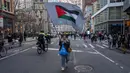 Para aktivis pro-Palestina mengambil alih jalan dalam aksi yang mereka sebut sebagai "Pemogokan Global untuk Gaza pada Hari Perempuan Internasional" pada 8 Maret 2024 di New York City. (David Dee Delgado/Getty Images North America/Getty Images via AFP)