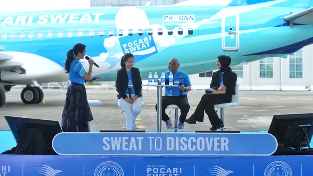 Pesawat dengan livery POCARI SWEAT