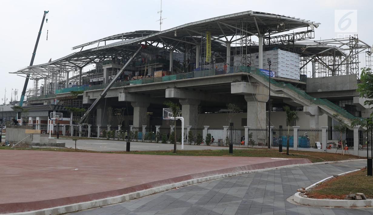 Tampilan salah satu sisi pembangunan Stasiun kereta LRT Velodrome Rawamangun, Jakarta, Selasa (17/7). LRT fase 1 rute Kelapa Gading-Velodrome Rawamangun sepanjang 5,8 kilometer ditargetkan selesai jelang Asian Games 2018. (Liputan6.com/Helmi Fithriansyah)