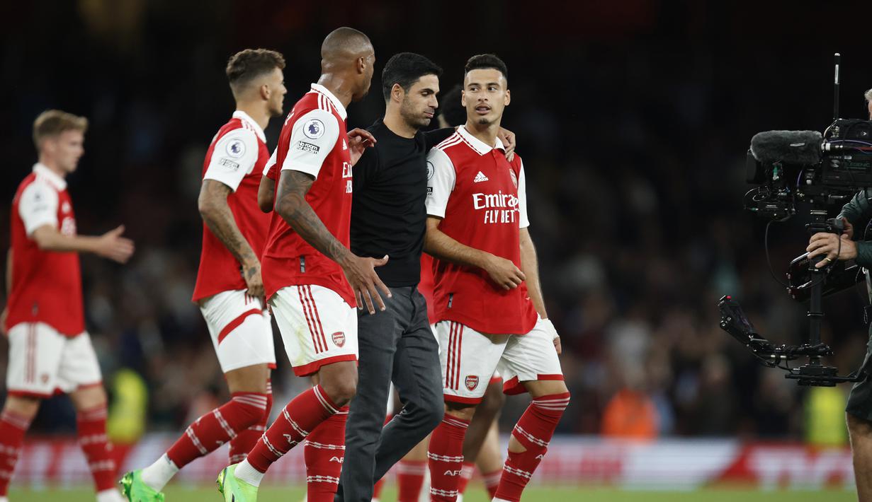 Dengan kemenangan ini Arsenal masih menjaga 100 persen kemenangannya hingga pekan kelima. Dengan koleksi 15 poin, The Gunners sementara memuncaki klasemen Liga Inggris musim 2022/2023. (AP/David Cliff)