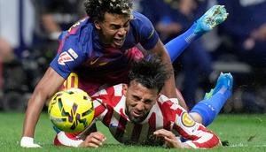 Barcelona berhasil memetik kemenangan saat bertandang ke markas Atletico Madrid dalam laga lanjutan Liga Spanyol 2025/2026 di Wanda Metropolitan, Madrid, Spanyol, Sabtu (04/04/2026) waktu setempat. (AP Photo/Bernat Armangue)
