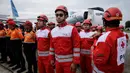 Tim gabungan tersebut berasal dari berbagai instansi, di antaranya Kementerian Koordinator Bidang Pembangunan Manusia dan Kebudayaan, Kementerian Kesehatan, BNPB, dan Basarnas. (YASUYOSHI CHIBA/AFP)