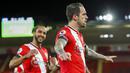 Penyerang Southampton, Danny Ings, melakukan selebrasi usai mencetak gol ke gawang Liverpool pada laga Liga Inggris di Stadion St Mary's, Selasa (05/01/2021). Liverpool takluk 1-0 dari Southampton. (AP/Noami Baker,Pool)