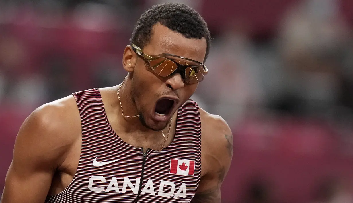 Pensiunnya Usain Bolt di cabang olahraga lari seolah menjadi angin segar bagi sprinter lain, termasuk Andre De Grasse. Benar saja, pelari asal Kanada langsung tunjukkan tajinya di nomor 200 meter putra Olimpiade Tokyo 2020. (Foto: AP/Markus Schreiber)