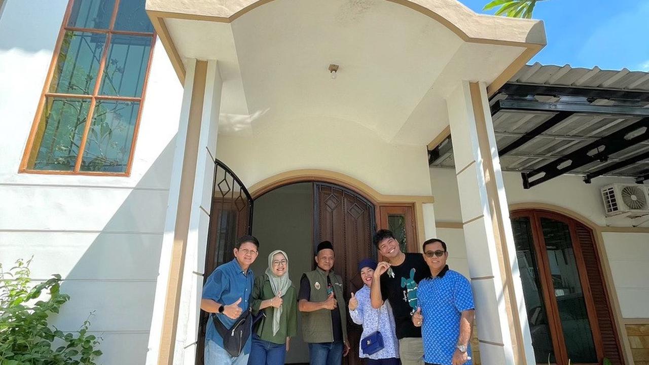 Haji Faisal dan Dewi Zuhriati Bangga