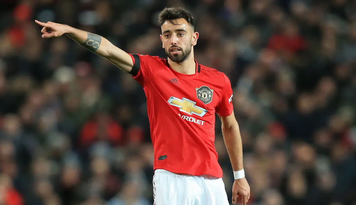 1. Bruno Fernandes - Manchester United mendatangkan Bruno Fernandes dari Sporting CP dengan transfer 60 juta euro. Selama membela Sporting, Bruno Fernandes telah mencetak 63 gol dan 52 assist dari 137 pertandingan di semua kompetisi. (AFP/Lindsey Parnaby)
