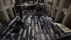 Pekerja berpose dengan karya seniman China Ai Weiwei berjudul History of Bombs di Imperial War Museum, London, Inggris, Rabu (29/7/2020). Imperial War Museum akan kembali dibuka pada 1 Agustus 2020 setelah pemerintah Inggris terus melonggarkan lockdown. (AP Photo/Matt Dunham)
