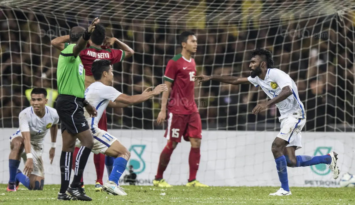 3.  Secara dramatis gawang Timnas Indonesia kebobolan pada menit ke-85 melalui sundulan gelandang Mlaaysia, N. Thanabalan. (Bola.com/Vitalis Yogi Trisna)