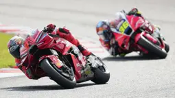 Marc Marquez memastikan gelar juara setelah finis kedua pada balapan MotoGP Jepang di Sirkuit Motegi hari Minggu (28/09/2025) siang WIB. (AP Photo/Hiro Komae)
