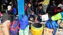 Para pemudik menunggu bus keberangkatan yang akan mengantarkan mereka ke kota tujuan, Jakarta, Senin (21/07/2014) (Liputan6.com/Faizal Fanani)