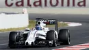 Pebalap Williams Martini Racing,  Valtteri Bottas  mencatat waktu tercepat yaitu 1m23,261s pada sesi kedua tes pramusim di Sirkuit Catalunya, Barcelona, Rabu (2/3/2016). Malam WIB. (AFP/Josep Lago)