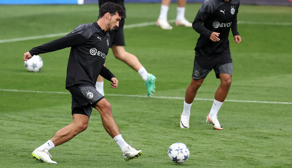 Musim ini, PSG dan Dortmund berada satu grup. (Photo by FRANCK FIFE / AFP)