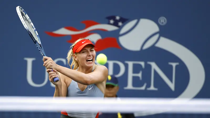 Maria Sharapova saat mengikuti AS Terbuka 2014. Sharapova dijadwalkan menghadapi Simona Halep pada turnamen tahun ini. (AP Photo/Jason DeCrow)