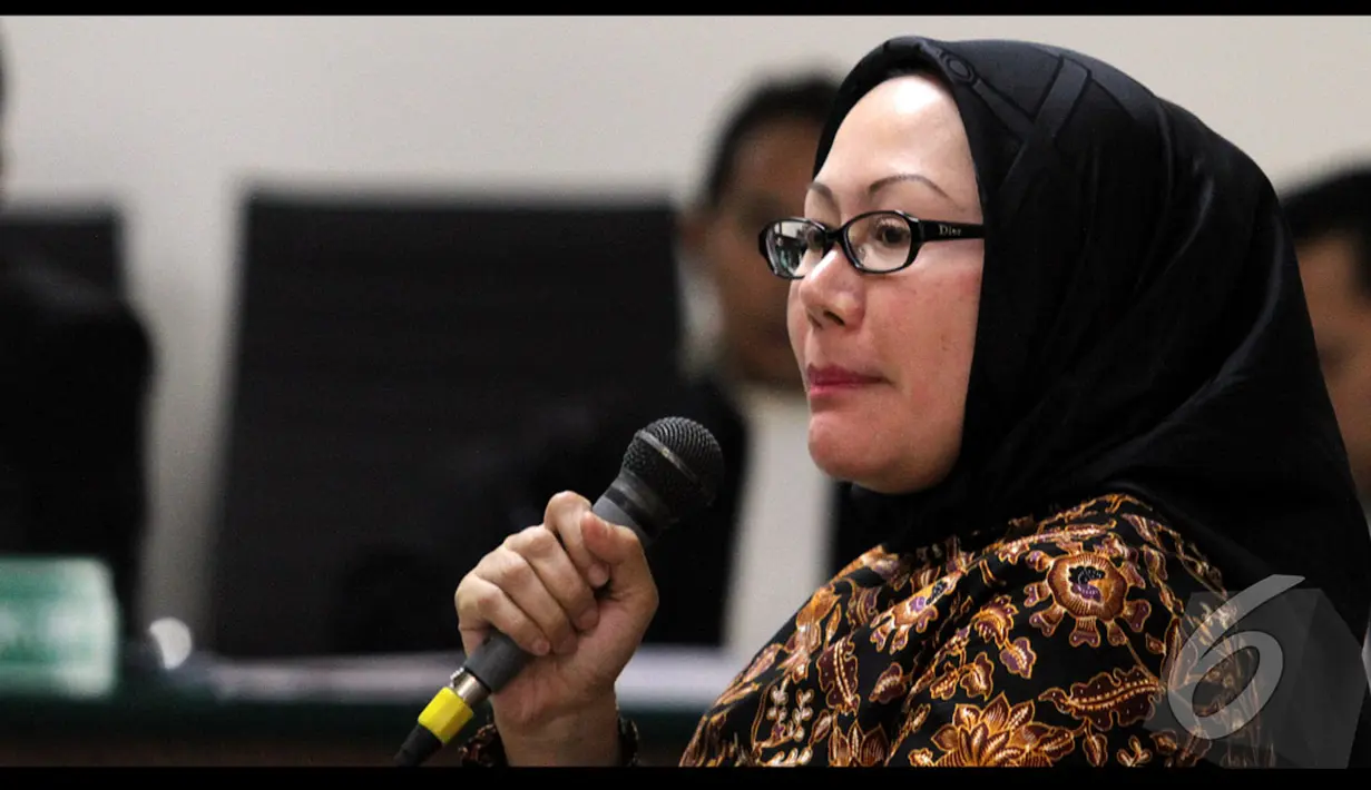 Atut mengklaim bahwa pertemuan dirinya dengan Akil Mochtar itu terjadi dengan tidak sengaja, Jakarta, Kamis (24/7/2014) (Liputan6.com/Faisal R Syam)