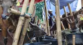 Pedagang berjualan hewan kurban yang dijual di kawasan Kuningan, Jakarta, Minggu (9/6/2024). (Liputan6.com/Angga Yuniar)