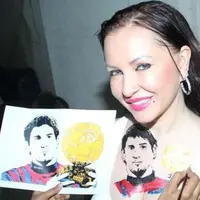 Fans Lionel Messi bikin tato wajah penggawa Barca bernomor punggung 10 itu.