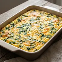 Resep telur panggang isi bayam dan keju (AI generated)