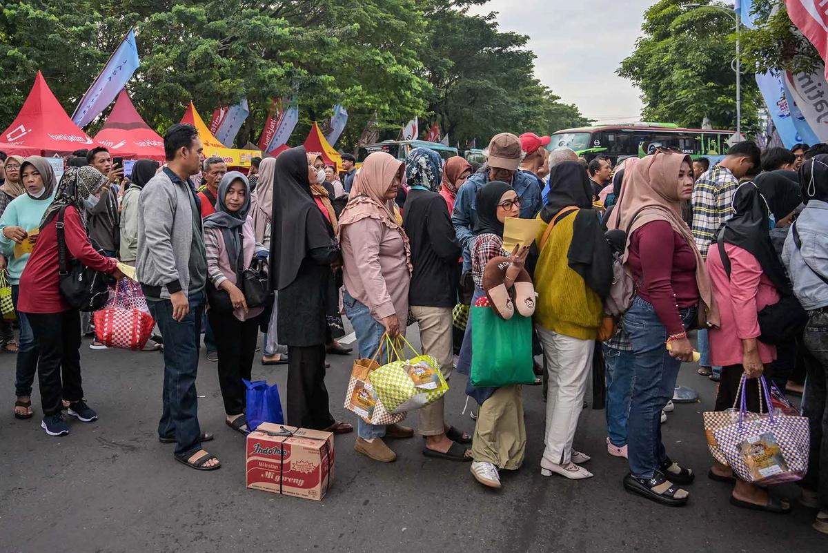 FOTO: Ribuan Warga Antusias Ikuti Program Mudik Gratis di Surabaya