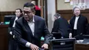 Terdakwa kasus dugaan suap pergantian antar-waktu (PAW) anggota DPR RI Harun Masiku dan perkara perintangan penyidikan, Hasto Kristiyanto usai mengikuti sidang pembacaan tuntutan di Pengadilan Tindak Pidana Korupsi (Tipikor) Jakarta, Kamis (3/7/2025). (Liputan6.com/Herman Zakharia)