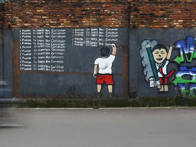 Sebuah mural yang bergambar himbauan atau berpesan untuk tidak korupsi di Jakarta, Minggu (05/03). Mural tersebut mengedukasi masyarakat untuk tidak melakukan praktik korupsi khususnya bagi para pelajar. (Liputan6.com/Helmi Afandi)