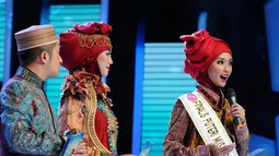 Siti Nurmelia Baskarani mampu memukau para dewan juri ketika memberikan sebuah jawaban dari pertanyaan mengenai nilai tambah yang akan diberikan oleh putri muslimah untuk bangsa Indonesia (Liputan 6.com/Andrian M Tunay)