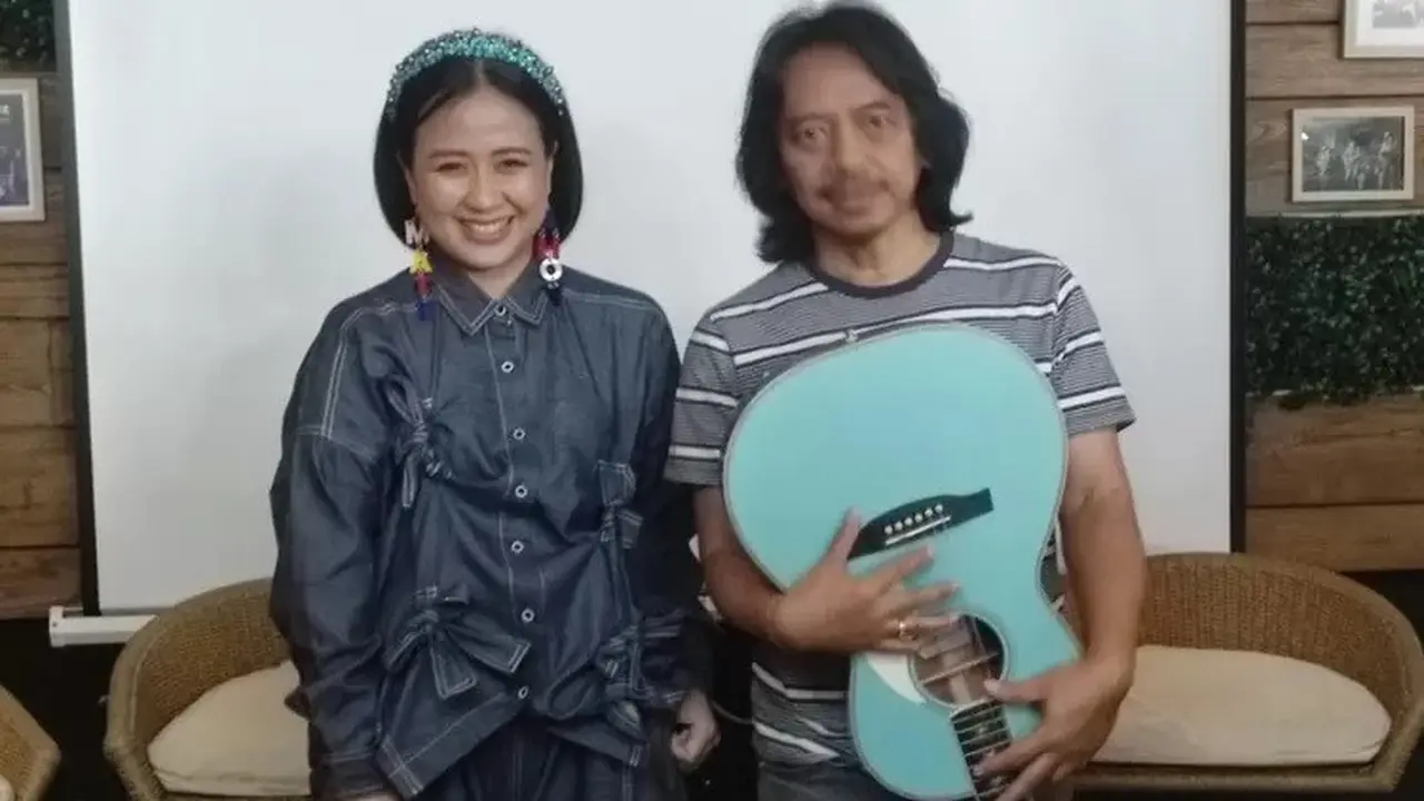 Astrid dan Dewa Budjana