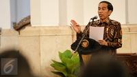 Presiden Joko Widodo (Jokowi) memberikan sambutan saat Peringatan Hari HAM se-dunia 2015 di Istana Negara, Jakarta, Jumat (11/12). (Liputan6.com/Faizal Fanani)