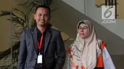 Hakim Pengadilan Negeri Tangerang Wahyu Widya Nurfitri bersiap meninggalkan gedung KPK usai menandatangani berkas P21, Jakarta, Jumat (11/5). Widya tersandung kasus suap penangan putusan perkara perdata sengketa Tanah. (Merdeka.com/Dwi Narwoko)